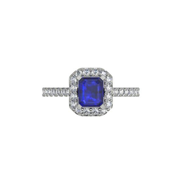 Platinum ring with emerald centre and 32 small round diamonds