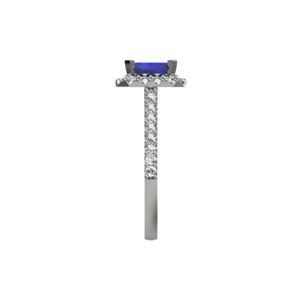 Platinum ring with emerald centre and 32 small round diamonds