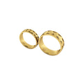 2 matching yellow gold bands with overlapping pattern
